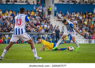 Estoril, Portugal - 09 17 2022: Liga BWIN Game Between Estoril Praia And F.C Porto; Mehdi Taremi Dribbles Next To Vital