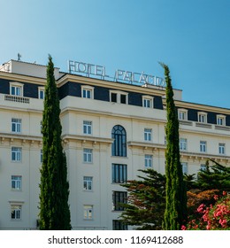 Estoril, Portugal - August 30th, 2018: Front facade of the famous Hotel Palacio which was frequented by both German and Allied spies during WWII, as well as Ian Fleming, cerator of James Bond