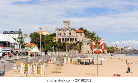 ESTORIL, PORTUGAL - JUNE 22, 2014: The Beach of Tamariz, Estoril, Portugal. Estoril is one of the most expensive resort area in Western Portugal