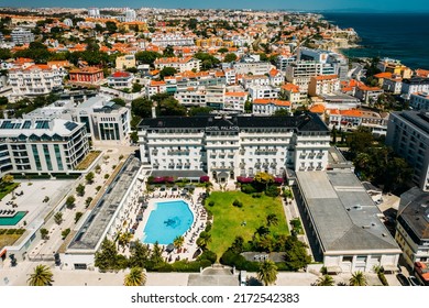 Estoril, Portugal - June 28, 2022: Aerial view of famous Hotel Palacio in Estoril, Portugal with surrounding neighbourhood