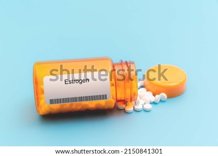 Estrogen. Estrogen Medical pills in RX prescription drug bottle ストックフォト © 