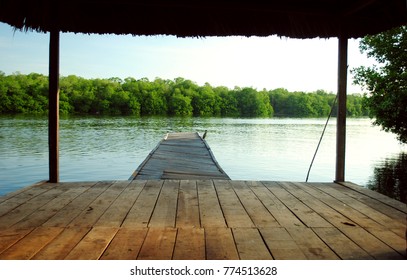 Estuary With Little Boat Port In The Mangrove Called 