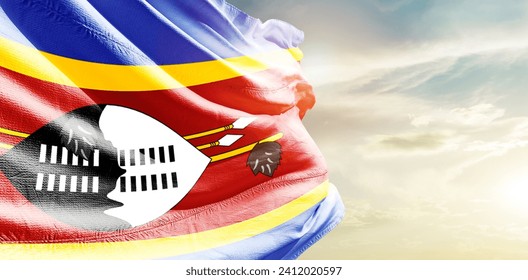 Eswatini national flag waving in beautiful clouds. - Powered by Shutterstock