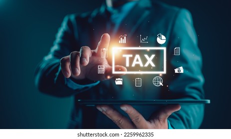 E-tax, Businessman show TAX for Individual income tax return form online for tax payment concept. Government, state taxes. Data analysis, paperwork, financial research, report. Calculation tax return. - Shutterstock ID 2259962335