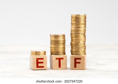 ETF Fund. ETF Management With Stocks And Bonds. Gold Coins In Pile As Symbol Of Profit.