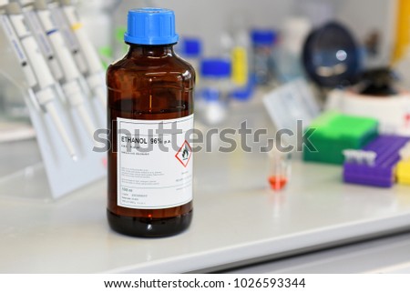 Ethanol in the jar on the working surface in the laboratory. Alcohol. Spiri. 