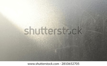 An ethereal abstract background featuring soft golden light flares and a hazy atmospheric glow creating a dreamy and artistic visual effect