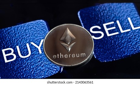 Ethereum coin  put on text BUY and Sell, digital money trading Concept. - Shutterstock ID 2143063561