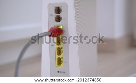 Ethernet Cable Connected to Home Internet Router Modem Port