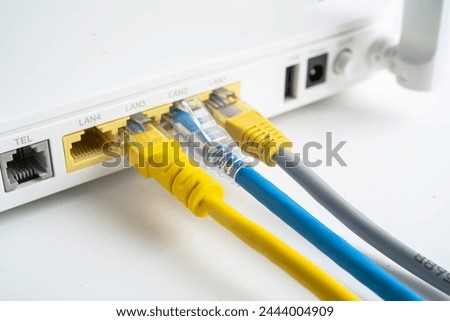 Ethernet cable with wireless router connect to internet service provider internet network.