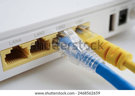 Ethernet cable with wireless router connect to internet service provider network. 