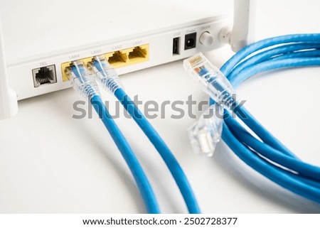 Ethernet cable with wireless router connect to internet service provider internet network.