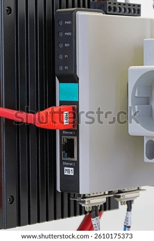 Ethernet data switch with connected patchcords with Rj45 connectors. 
