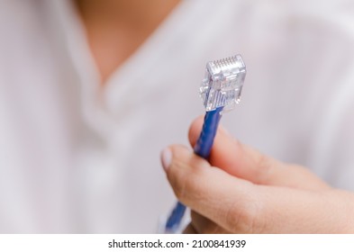 ethernet plug for internet connection - Shutterstock ID 2100841939