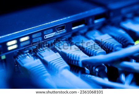 Ethernet switch in server room with cables