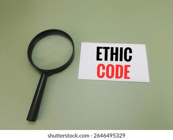 Ethic Code Concept with Magnifying Glass Focus on Text, Business Integrity, Corporate Governance, Compliance Standards, Professional Responsibility and Morality Background. 