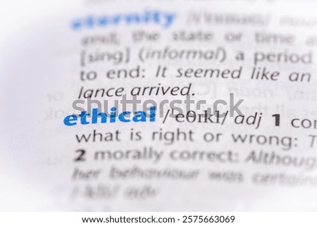 Ethical word in a dictionary. Selective focus, close up.