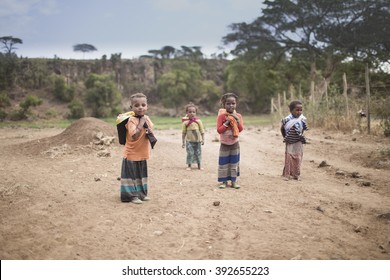 Ethiopia, Jigjiga 2016 Countries threatened by drought this year.Small children carry water to their house on their backs 