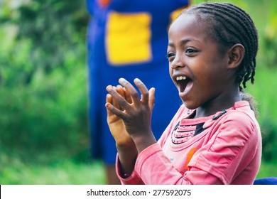 Ethiopian Girl Singing And Clapping During A Party