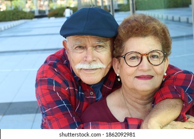 Ethnic elder couple showing affection 