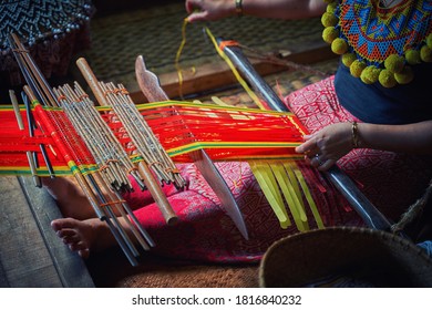 The Ethnic Iban Lady Doing A Crafting At Sarawak Culture Village For Tourist To See The Unique Culture In Sarawak                              