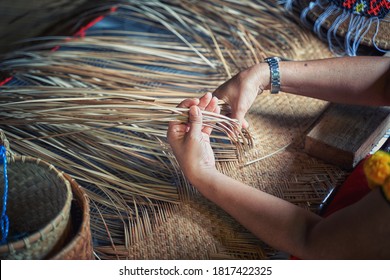 The ethnic Iban Lady doing a crafting at Sarawak Culture Village for tourist to see the unique culture in Sarawak                            