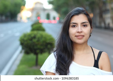 Ethnic woman outdoors close up
