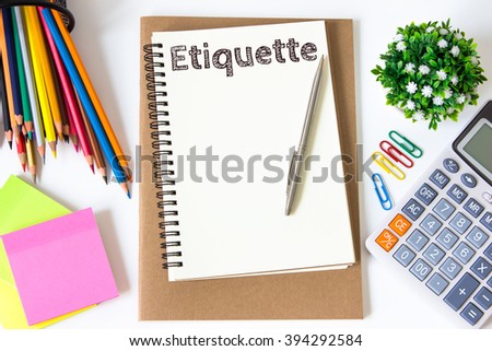 etiquette text message on white paper and office supplies, pen, paper note, on white desk , copy space / business concept / view from above, top view