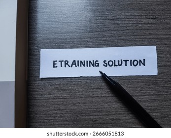 Etraining solution writting on table background.