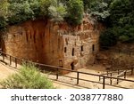 Etruscan Necropolis of the Caves - Populonia. Underground chamber tombs carved into the sandstone. They all date back to the Hellenistic period (4th - 2nd century BC). Tuscany - Italy