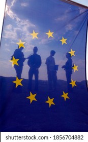 EU Citizens With Blue European Union Flag With Yellow Stars