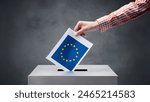 EU concept background European elections in Germany. A woman throws ballot paper with European flag into the ballot box.