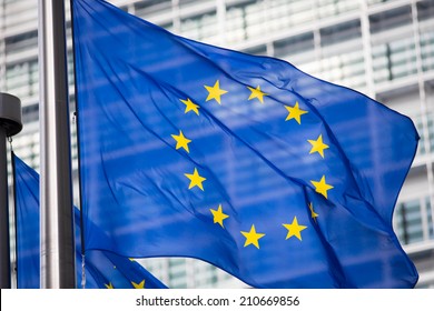 EU Flag In Front Of Berlaymont Building Facade