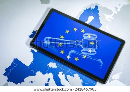 EU Flag with gavel and sound block on smartphone screen over a Eu map. Suitable for concepts as Artificial Intelligence or AI Act, European union Legal sistem and Directives.