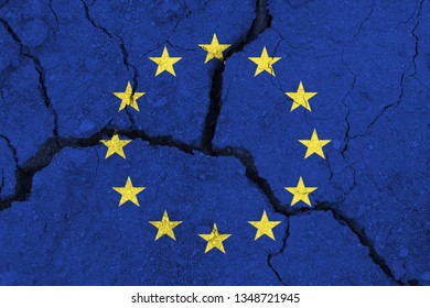 EU Flag On The Cracked Earth. Europe Flag. Earthquake Or Drought Concept. Brexit