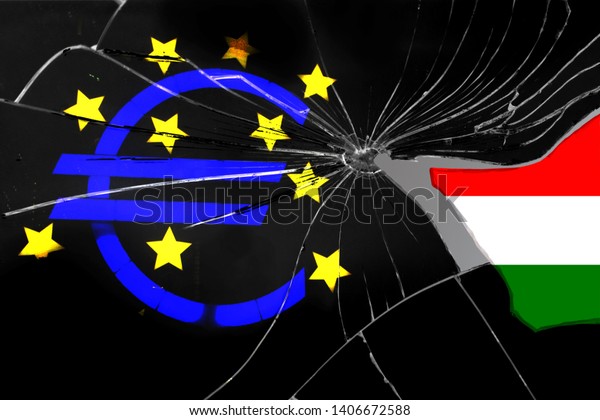 EU flag on the texture of broken\
into sharp fragments of black glass with a separate fragment of the\
flag of Hungary, the concept of a country leaving the\
EU