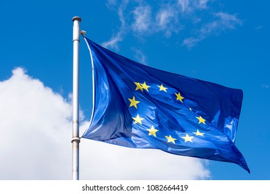 EU Flag Waving Against Blue Sky