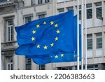 EU flags in front of European Commission in Brussels, Belgium