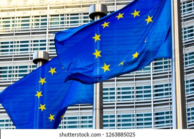 EU flags in front of European Commission in Brussels. 17-12-2018 - Shutterstock ID 1263885025