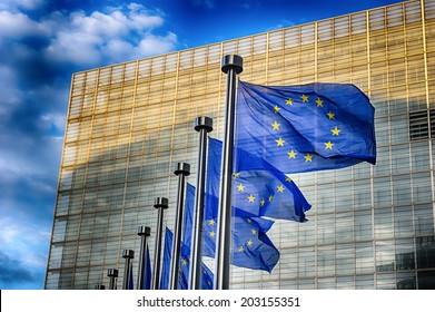 EU flags in front of European Commission in Brussels