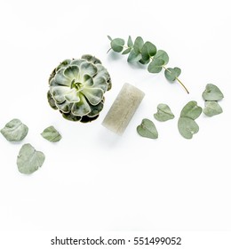 Eucalyptus Green Succulent, Candle, Leaves Isolated On White Background. Flat Lay, Overhead View