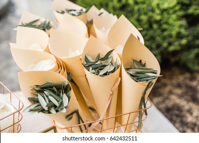 Eucalyptus petals confetti in wedding ceremony.