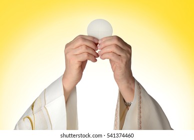 Eucharistic Communion And Hands Priest