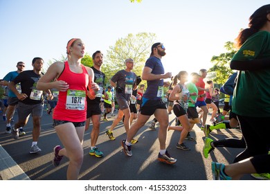 EUGENE, OR - MAY 1, 2016: Runners In A Pack At The Start Of The 2016 Eugene Marathon, A Boston Qualifying Event.