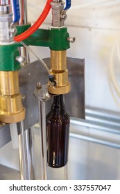 EUGENE, OR - NOVEMBER 4, 2015: Beer Bottling Machine At The Startup Craft Brewery Mancave Brewing.