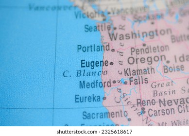 Eugene on political map of globe, travel concept, selective focus, background