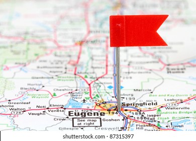 Eugene, Oregon. Red flag pin in an old map showing travel destination.