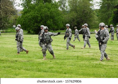 EUGENE, OREGON, USA  May 2, 2012: Eugene, OR The Local Emergency Services And National Guard Work Together In A Disaster Drill. The National Guard Troopers Are Securing The Helicopter Landing Zone.