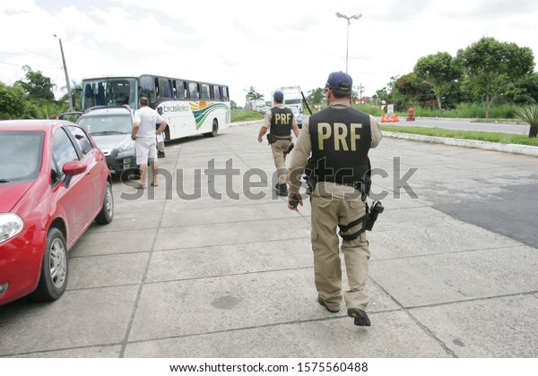 EUNAPOLIS, BAHIA / BRAZIL - April 21, 2011:\
Federal Highway Police (PRF) agents inspect highway BR 101 during\
inspection\
operation.\
