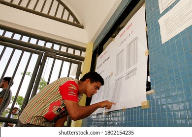 Eunapolis, Bahia / Brazil - November 6, 2010: People Look At Attendance List For Exams Of The National High School Exam - Enem - In The City Of Eunapolis.